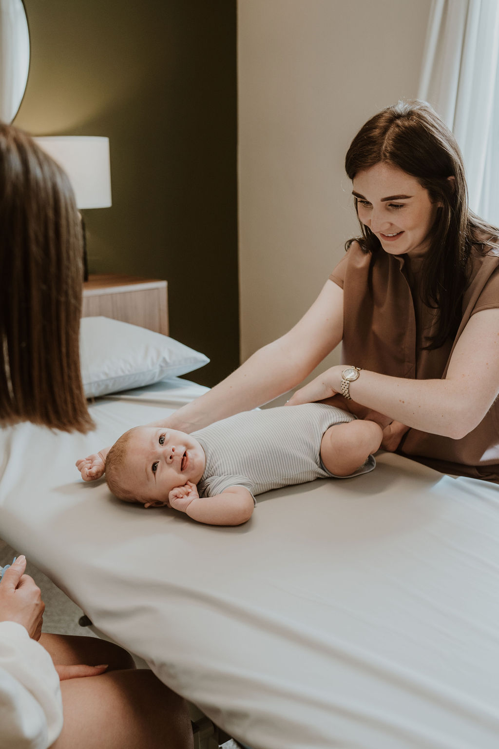 Osteopath Hannah Hilton treating a baby