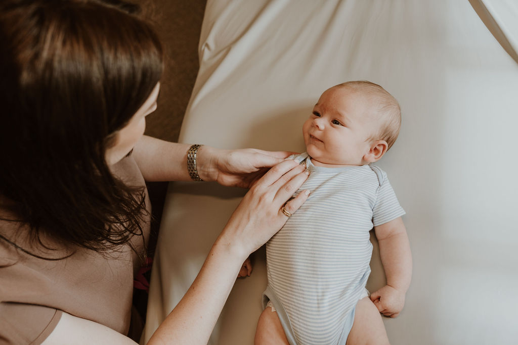 Osteopath Hannah Hilton assessing a baby