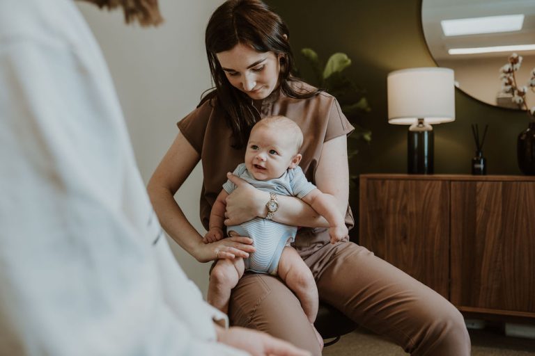 Osteopath Hannah Hilton treating a baby