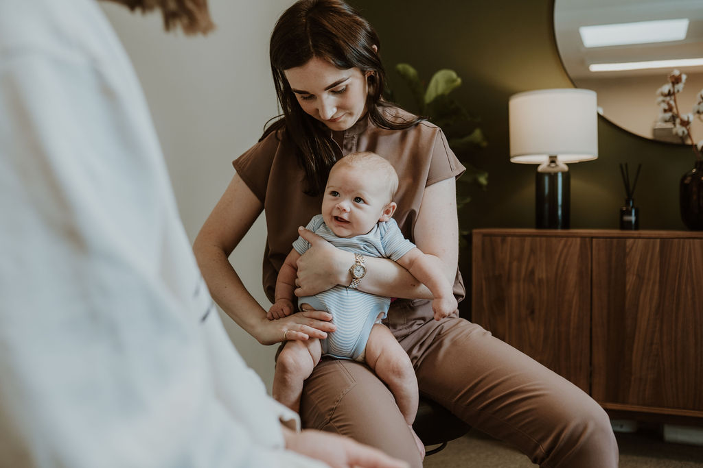 Osteopath Hannah Hilton treating a baby