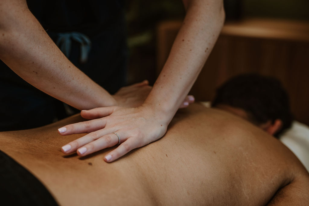 Osteopath Warrington Hannah Hilton treating a male patient