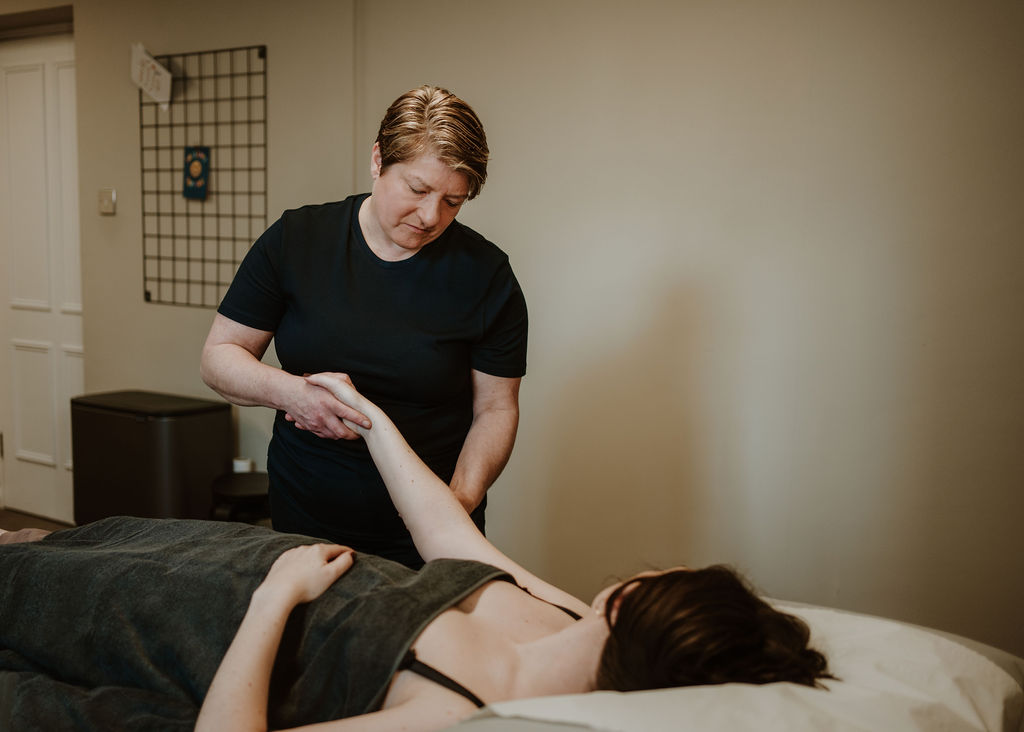 Osteopath Catherine Wasik treating a wrist